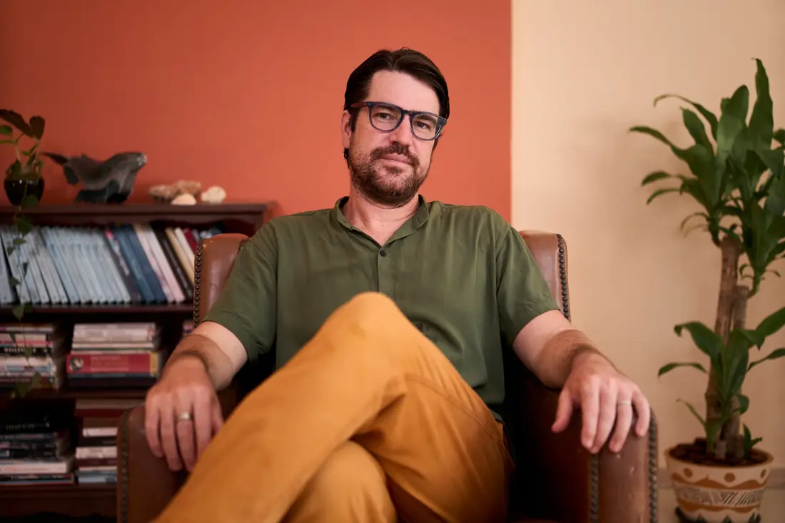 Retrato profissional de Valentin Heigl em seu consultório